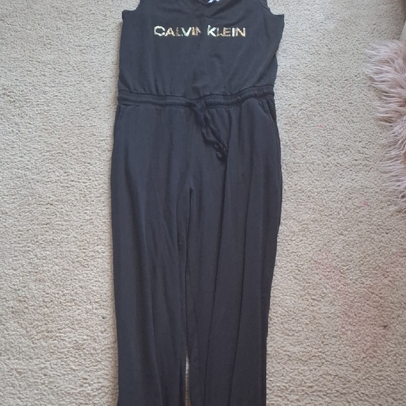 Calvin Klein Pants - Calvin Klein Black Sleeveless Jumpsuit with Gold Logo